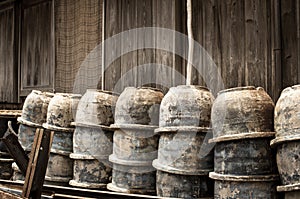 Abandoned pottery bowls stacked outside