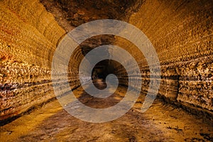 Abandoned prospecting adit. Tunnel at limestone at abandoned mine photo