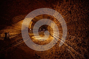 Abandoned prospecting adit. Tunnel at limestone at abandoned mine photo