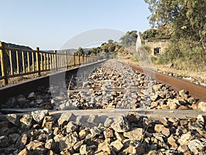 Abandoned railroad tracks through the mountains