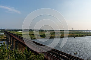 Abandoned railway over farm