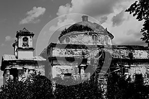 Abandoned reconstruction of an old building in the style of black and white photography. Summer photography