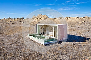 Abandoned refrigerator in the countryside