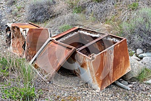 Abandoned refrigerators in a ditch