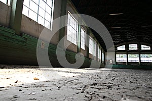 Abandoned riding hall without horses and horsemen