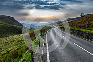 Abandoned Road Through Spectacular Rural Landscape Of Snowdonia National Park In North Wales, United Kingdom