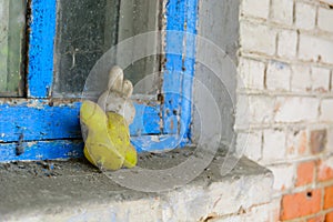 Abandoned room after the disaster. Children`s toys in the dirt in an abandoned kindergarten in Chernobyl