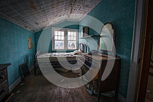 Abandoned Room with an old phone and dresser