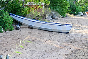 Abandoned rowboat on the beautiful beach