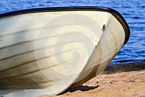 Abandoned rowboat on the beautiful beach