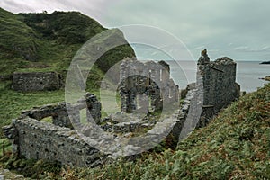 The abandoned ruined factory buildings of the Llanlleiana old porcelain works