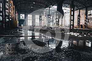 Abandoned ruined industrial factory building, ruins and demolition concept