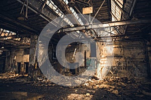 Abandoned ruined industrial warehouse or factory building inside, corridor view with perspective, ruins and demolition concept