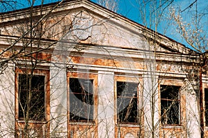 Abandoned Ruined Old Village School Building In Chernobyl Resettlement Zone. Belarus. Chornobyl Catastrophe Disasters