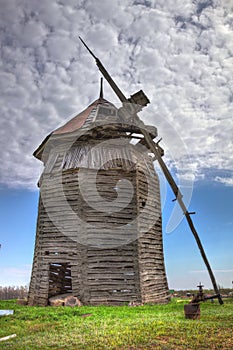 Abandoned ruined wooden windmill