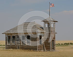 The abandoned and rundown Burnham Schoolhouse in Havre, Hill County, Montana