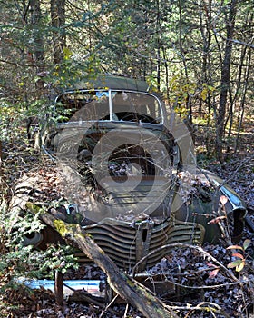 Abandoned rusty old car