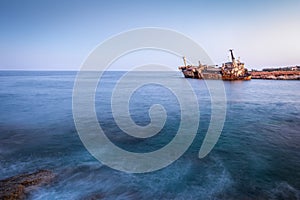 Abandoned rusty ship Edro III near Pegeia, Paphos, Cyprus at sunrise