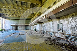 Abandoned school gym in ghost town Pripyat Chornobyl Zone photo