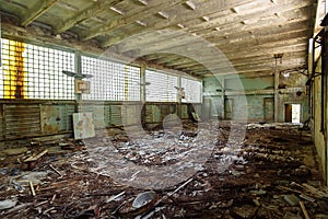 Abandoned school gym in ghost town Pripyat Chornobyl Zone photo