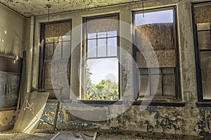 Abandoned Schoolroom With Large Windows