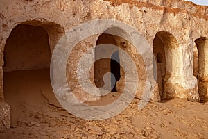 Abandoned set for the filming of Star Wars movie in the Sahara Desert against the backdrop of sand dunes.