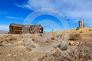 Abandoned shack and water tank on the Nevada desert