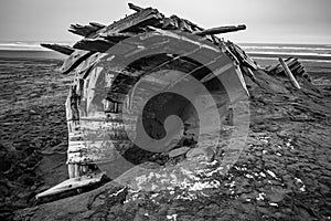 abandoned ship wrack on black beach in Icel