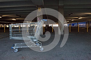 Abandoned shopping trolley in car park