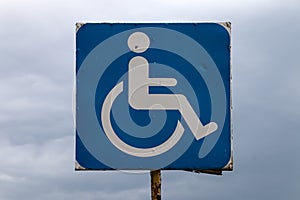 Abandoned sign of the site for the disabled.