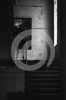 Abandoned staircase on black and white