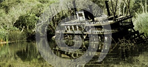 Abandoned Steamboat on river