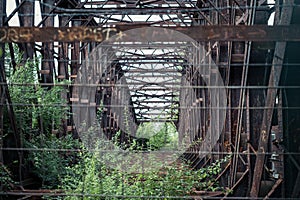Abandoned steel bridge - rusted steel beam construction