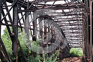 Abandoned steel bridge - rusted steel beam construction