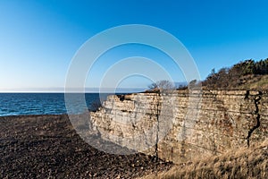 Abandoned stone pit by the coast