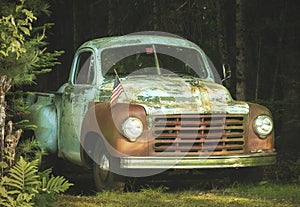 An abandoned Studebaker rests on the side of the road near Sugar Hill, New Hampshire. photo