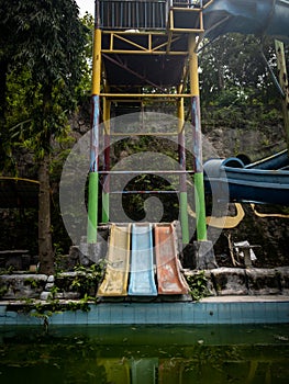 Abandoned Swimming Pool with Overgrown Vegetation