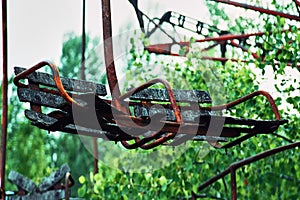 Abandoned swing in amusement park in Pripyat