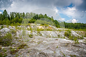 Abandoned talc quarry overgrown