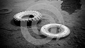 Abandoned tire on the water sea or lake pond with black and white style color