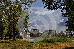 Abandoned tower of the ruins of St Benedek castle on a sunny day, in Transylvania