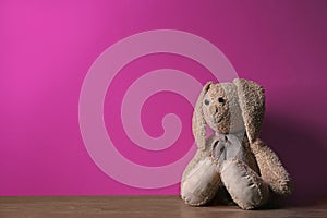 Abandoned toy bunny on table