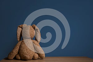 Abandoned toy bunny on table