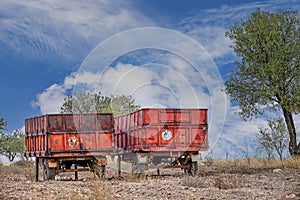 Abandoned tractor trailers in the field.