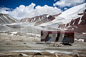 Abandoned trailer in high mountains