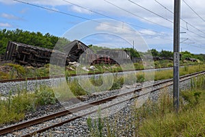 Abandoned train carriages near the tracks at Addo Elephant National Park on South Africa