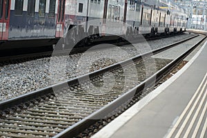 Abandoned train station platform due to corona virus quarantine and home office measures for commuters