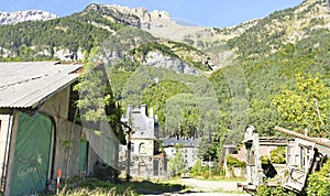 Abandoned train wagons destroyed by nature in the old Canfranc station, Huesca