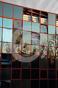 Abandoned vandalized glass fronted office building