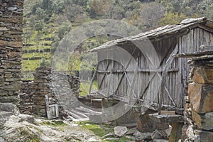 Abandoned Village in the middle at mountains, rural scene, ruin schist house made and mountain landscape